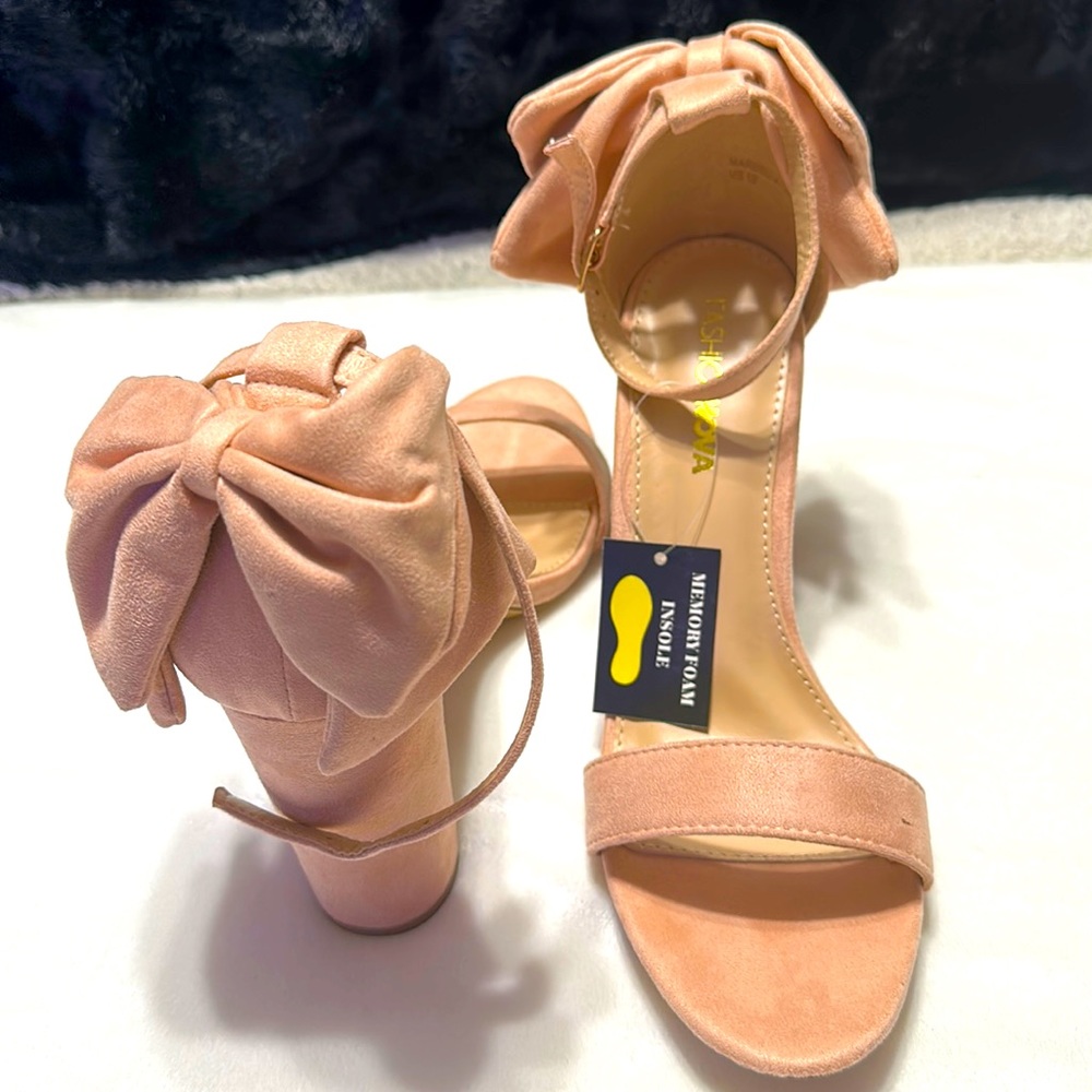 Fashion Nova Blush sandals with a bow on the back